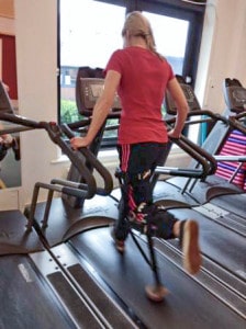 Below knee amputee Sarah on treadmill with iWALK Hands-Free Crutch