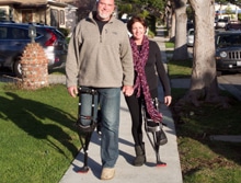Couple wearing iWALK Hands-Free Crutches