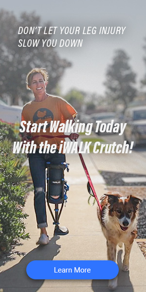Woman walking her dog with the iWALK crutch - iWALKFree